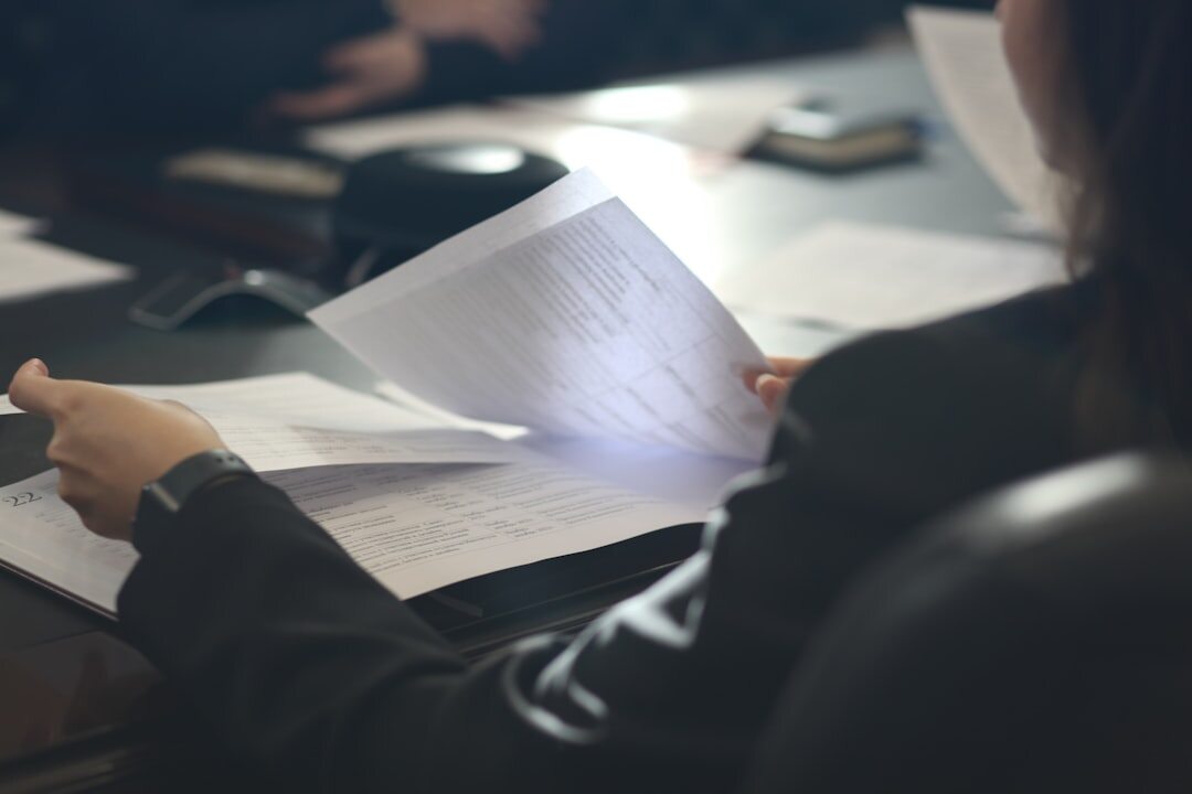 person reading old documents