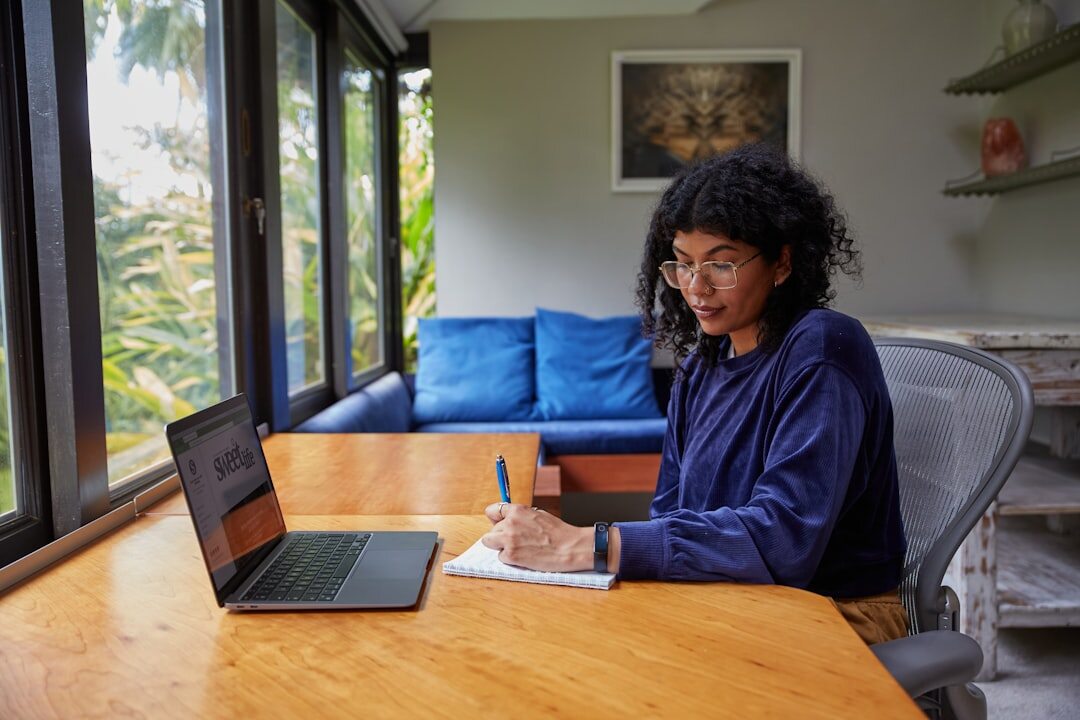 author writing at desk